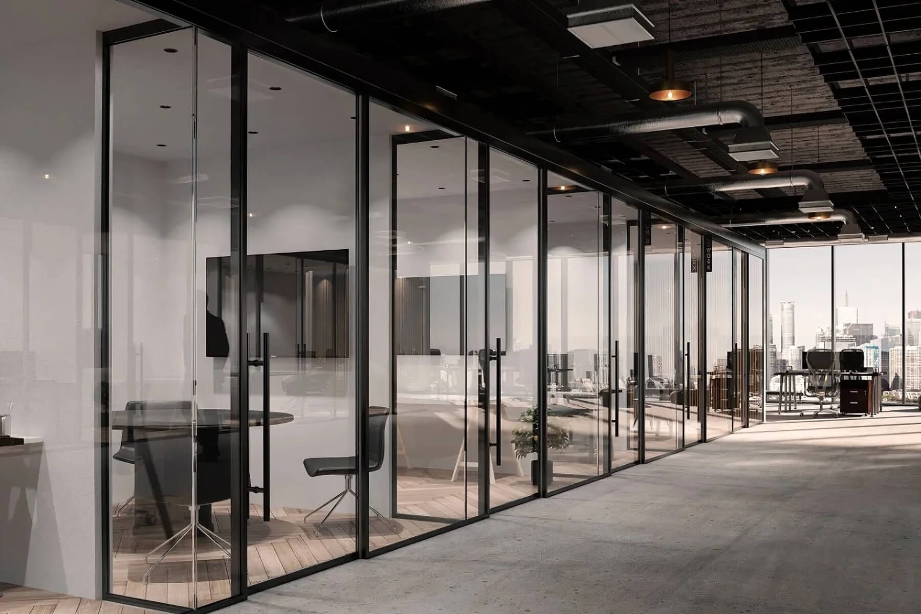 Modern office with glass partitions and exposed ceiling